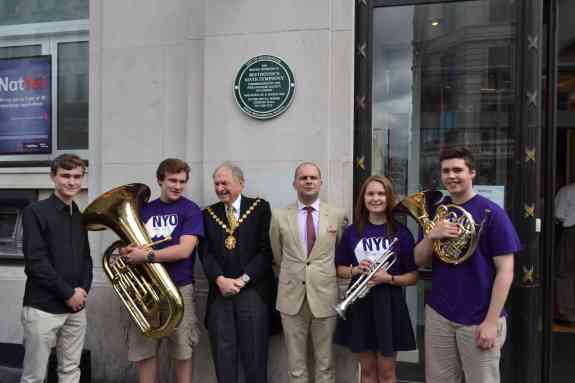 ltor  composer Bertie Baigent Cllr Michael Braham and John Gilhooly Chairman of the Royal Philharmonic Society with members of the National Youth Orc